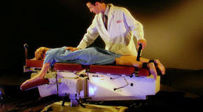This is a picture of Cox Technic chiropratic spinal manipulation as performed at Minster Chiropractic Center.